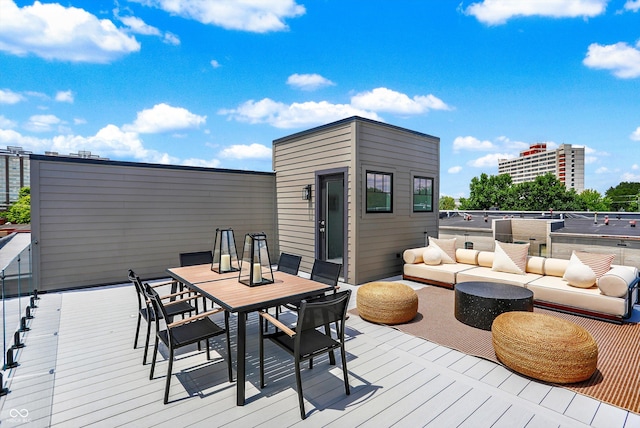 wooden deck with an outdoor hangout area