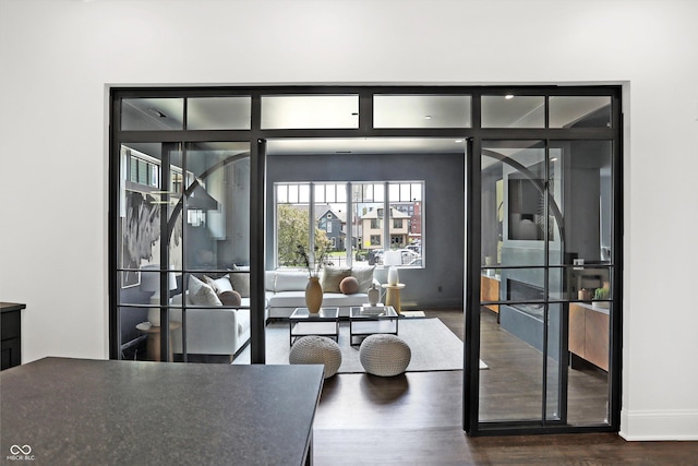 dining space featuring dark hardwood / wood-style floors