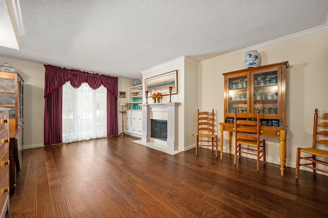 living room featuring crown molding, dark hardwood / wood-style flooring, and a textured ceiling