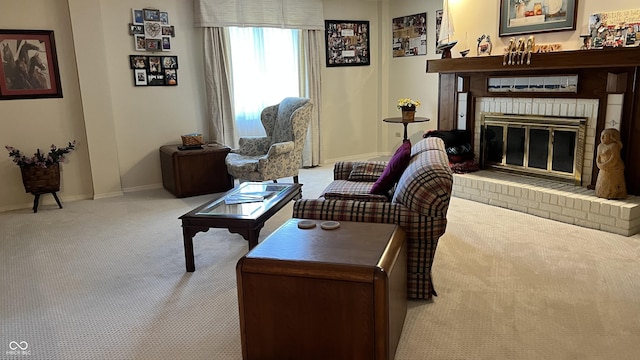 carpeted living room with a brick fireplace