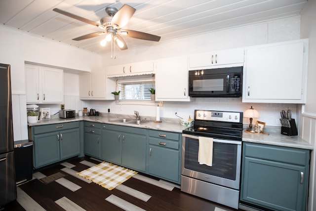 kitchen featuring white cabinets, blue cabinets, sink, stainless steel electric stove, and ceiling fan