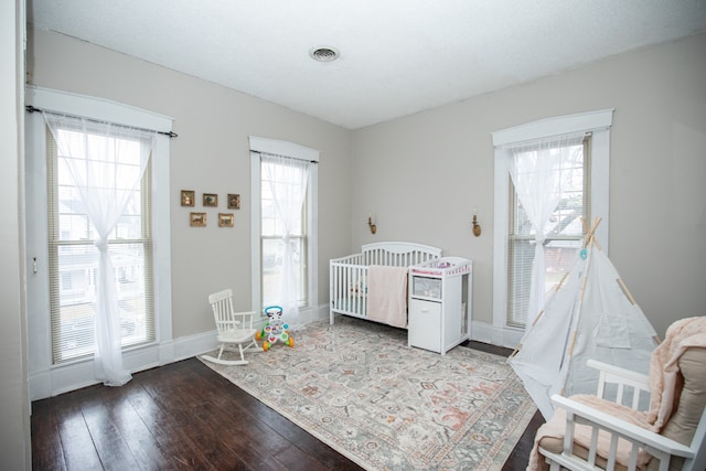 bedroom featuring hardwood / wood-style floors