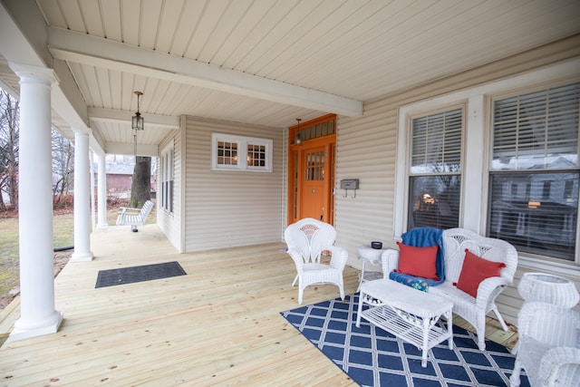 wooden deck with covered porch