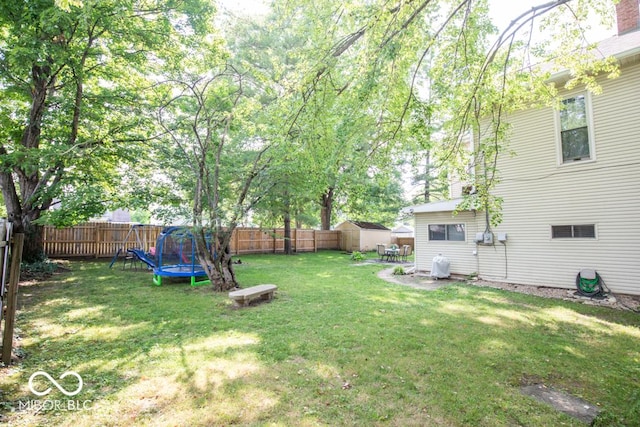 view of yard featuring a trampoline