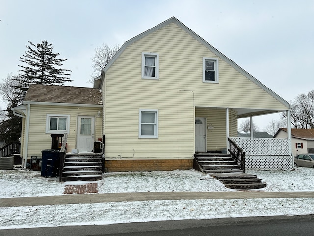 view of front of home featuring central AC unit