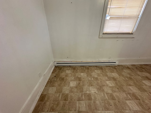 empty room with a baseboard radiator