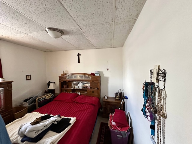 bedroom featuring a drop ceiling