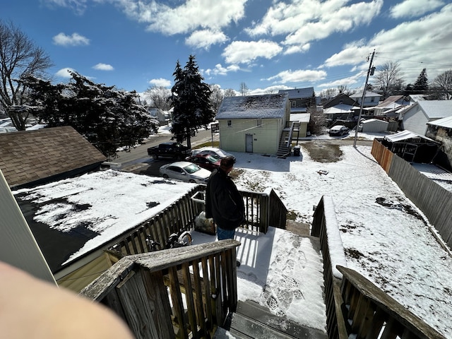 view of snow covered deck