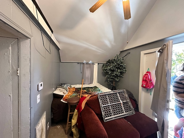 bedroom with ceiling fan and lofted ceiling