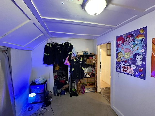 bonus room featuring carpet and vaulted ceiling