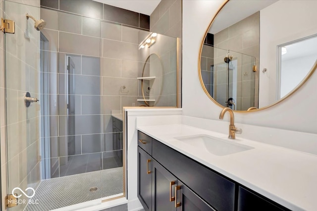 bathroom featuring vanity and a tile shower