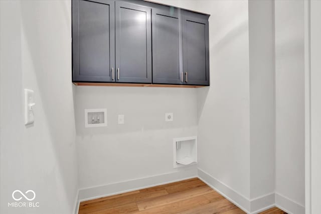 laundry area featuring light wood-type flooring, washer hookup, cabinets, and electric dryer hookup