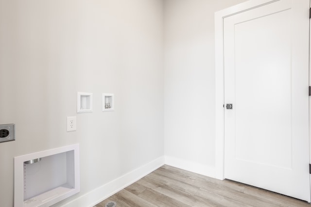 laundry room with hookup for an electric dryer, washer hookup, and light hardwood / wood-style flooring