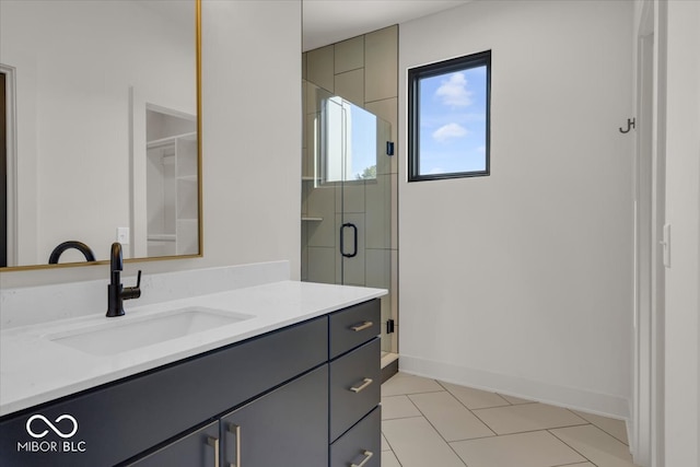 bathroom featuring vanity, walk in shower, and tile patterned floors