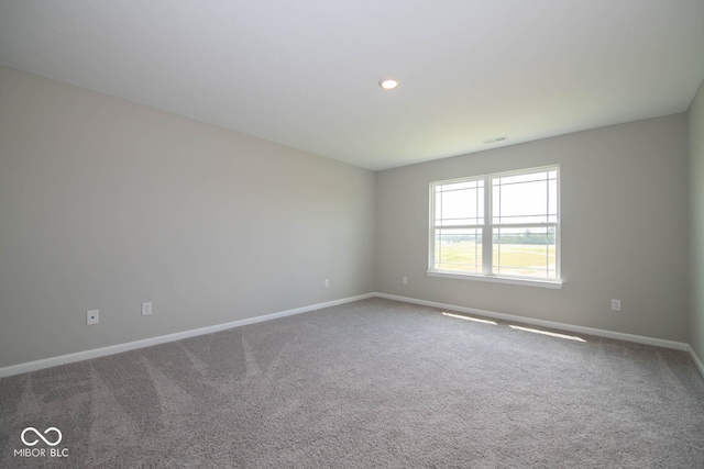 view of carpeted spare room