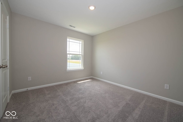 view of carpeted spare room