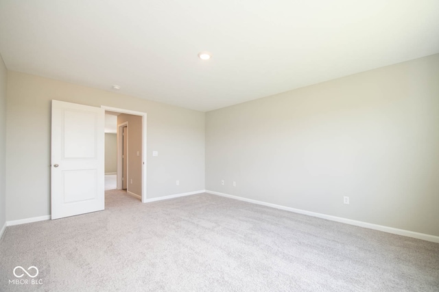 unfurnished bedroom featuring carpet