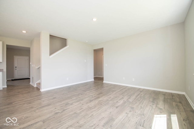 empty room featuring hardwood / wood-style flooring