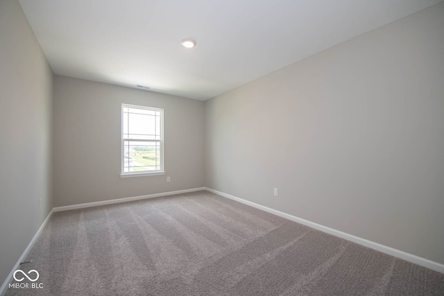 spare room with carpet flooring