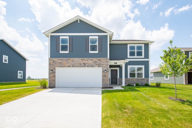 view of front of house with a garage and a front lawn