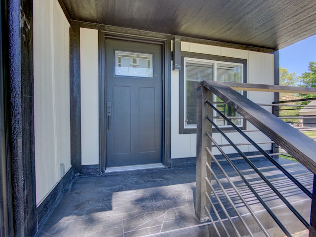 property entrance with a balcony