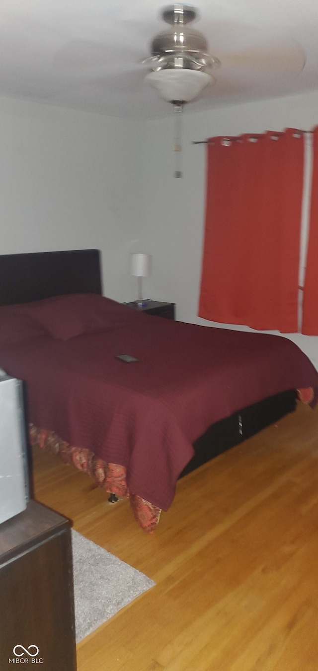 bedroom featuring hardwood / wood-style floors