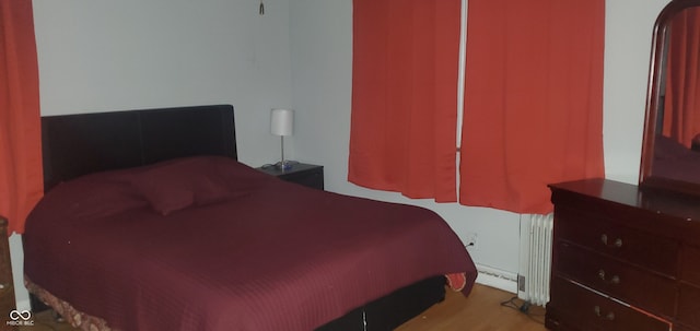 bedroom featuring light wood-type flooring