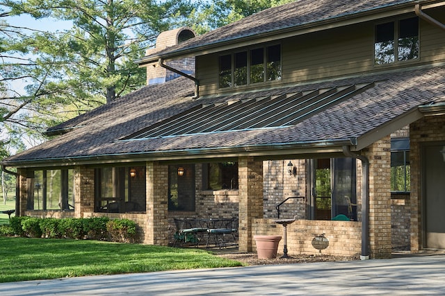 exterior space with a front lawn