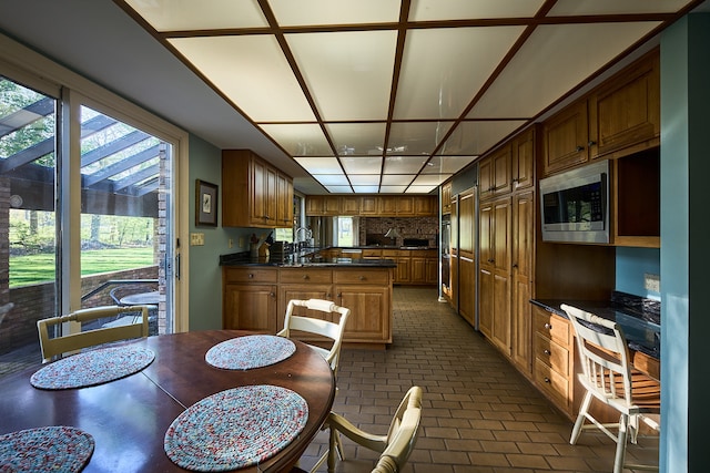 dining space with sink