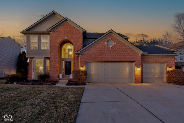 front of property with a garage