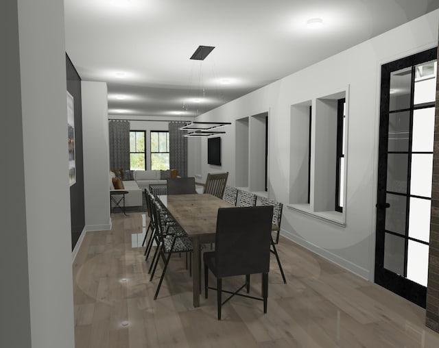 dining area with wood-type flooring