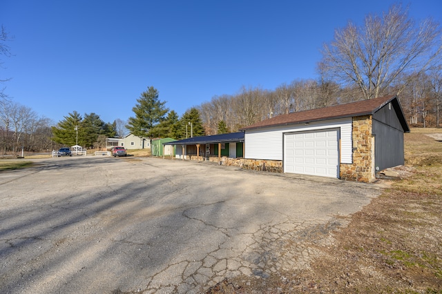 single story home with a garage