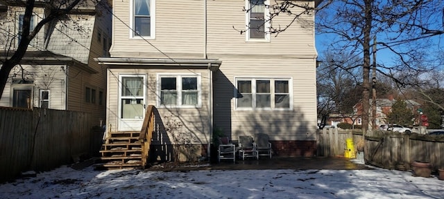 view of snow covered house