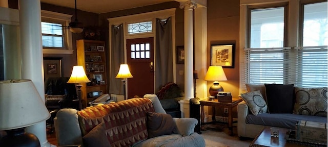 living room with ornate columns