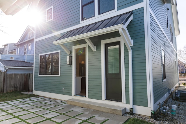 property entrance with a patio area