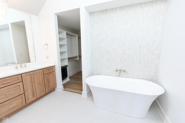 2133 N Talbott St, Indianapolis, IN 46202 - full bath with a soaking tub, vanity, and a walk in closet