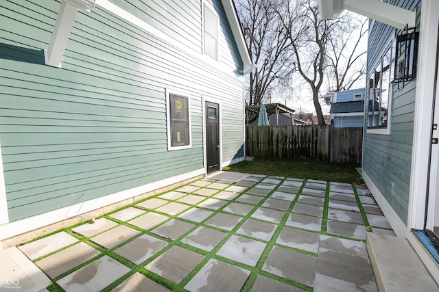 2133 N Talbott St, Indianapolis, IN 46202 - fenced backyard featuring a patio