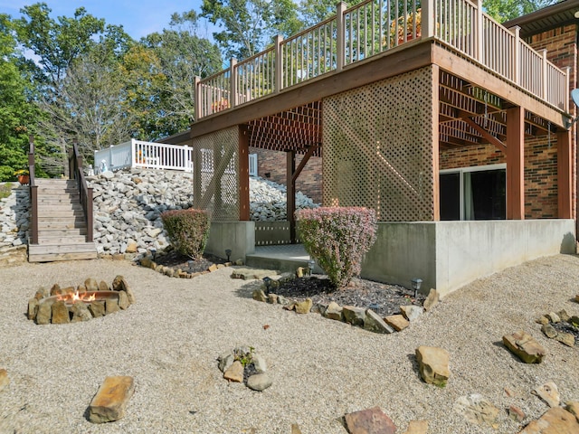 view of side of property featuring a deck