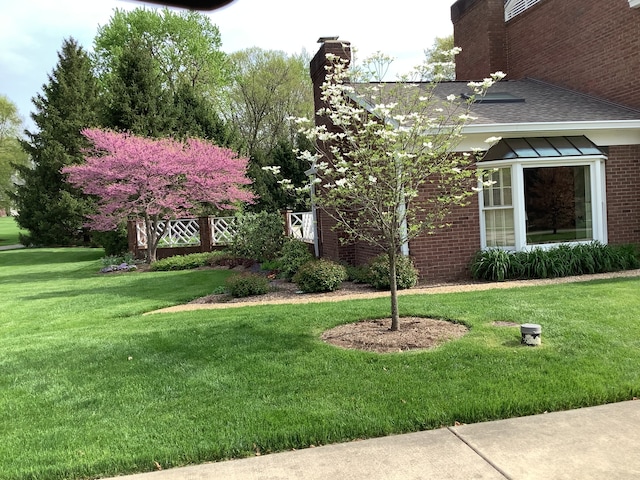 exterior space with a front lawn