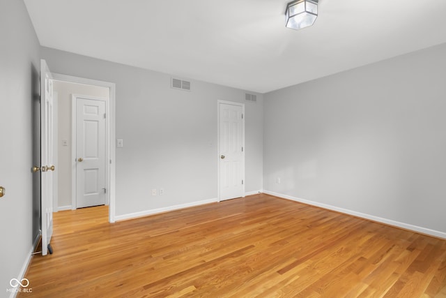 empty room featuring light hardwood / wood-style floors