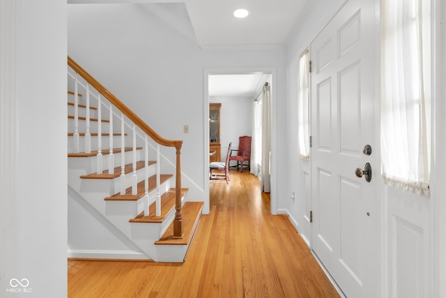 entrance foyer with light hardwood / wood-style floors