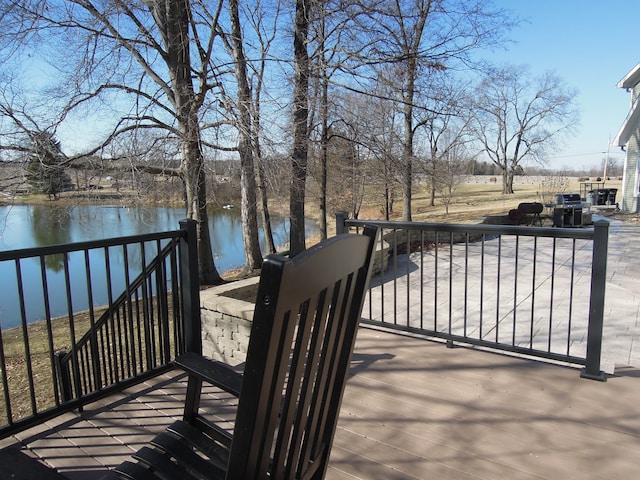 wooden terrace with a water view