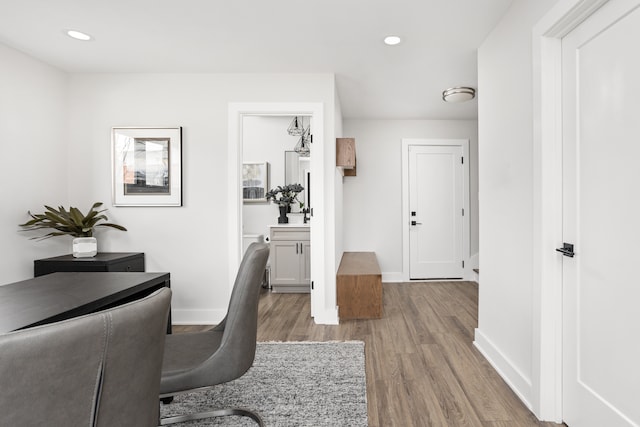 office space with hardwood / wood-style floors