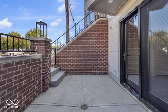 view of patio with a balcony