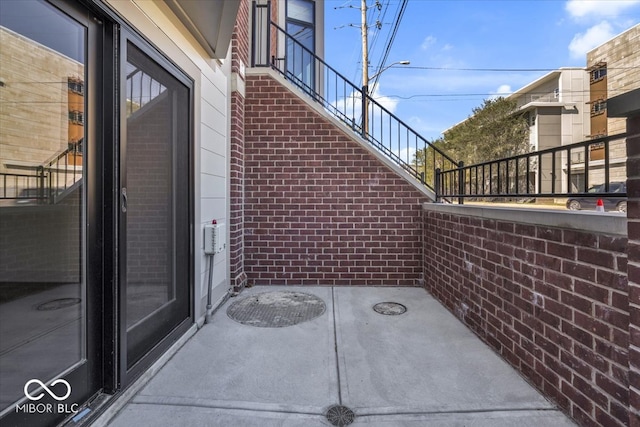 view of patio / terrace with a balcony