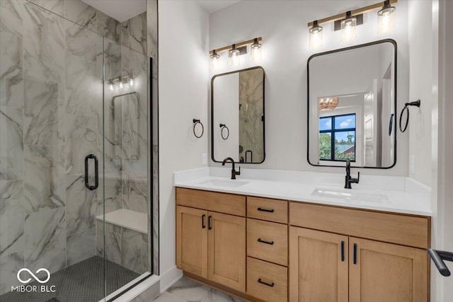 bathroom with walk in shower and vanity