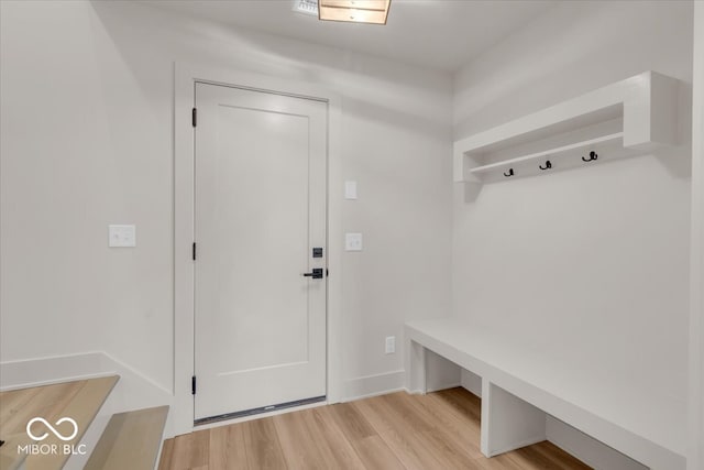 mudroom with light hardwood / wood-style floors