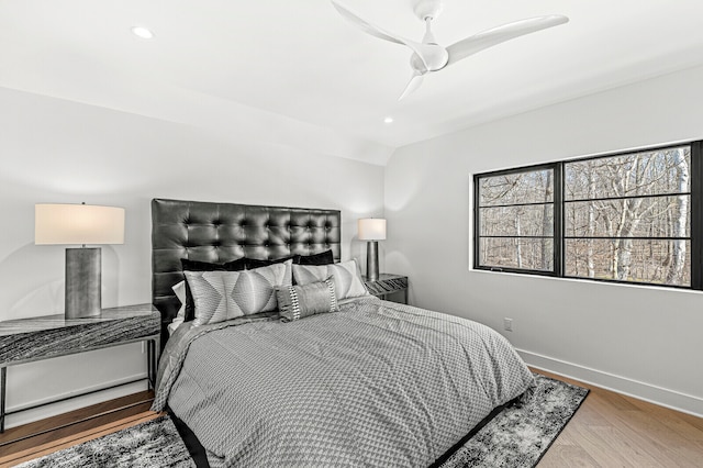 bedroom featuring ceiling fan and light wood-type flooring