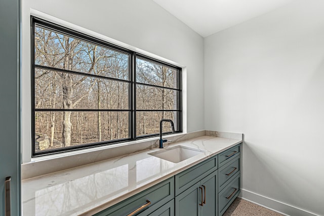 bathroom with plenty of natural light and vanity