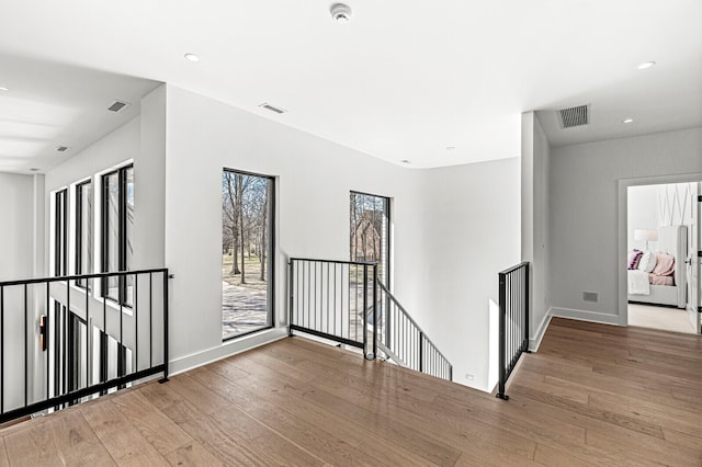 hallway featuring light hardwood / wood-style floors